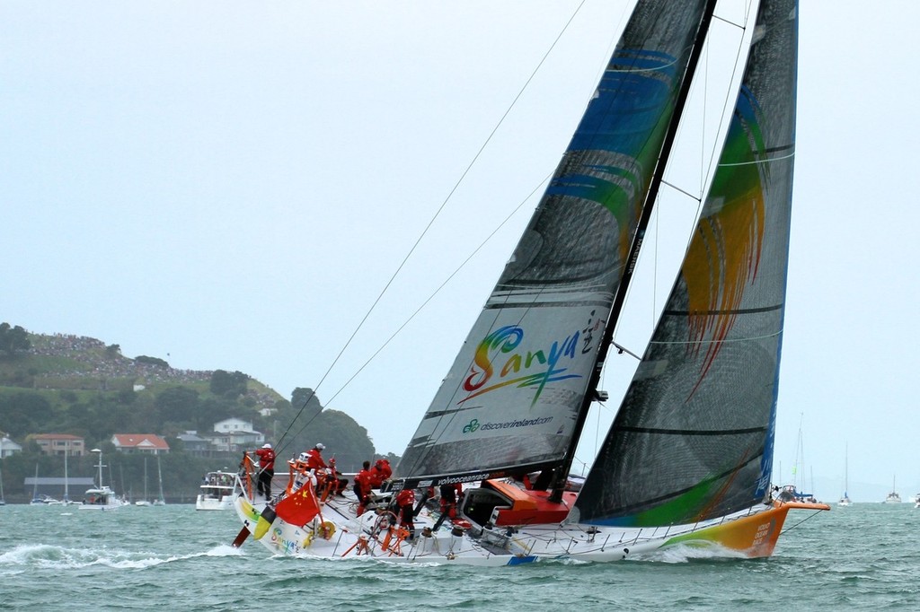 Team Sanya at the entrance to the Waitemata, with the crowds watching from North Head - Volvo Ocean Race Auckland - Start March 18,2012 © Richard Gladwell www.photosport.co.nz